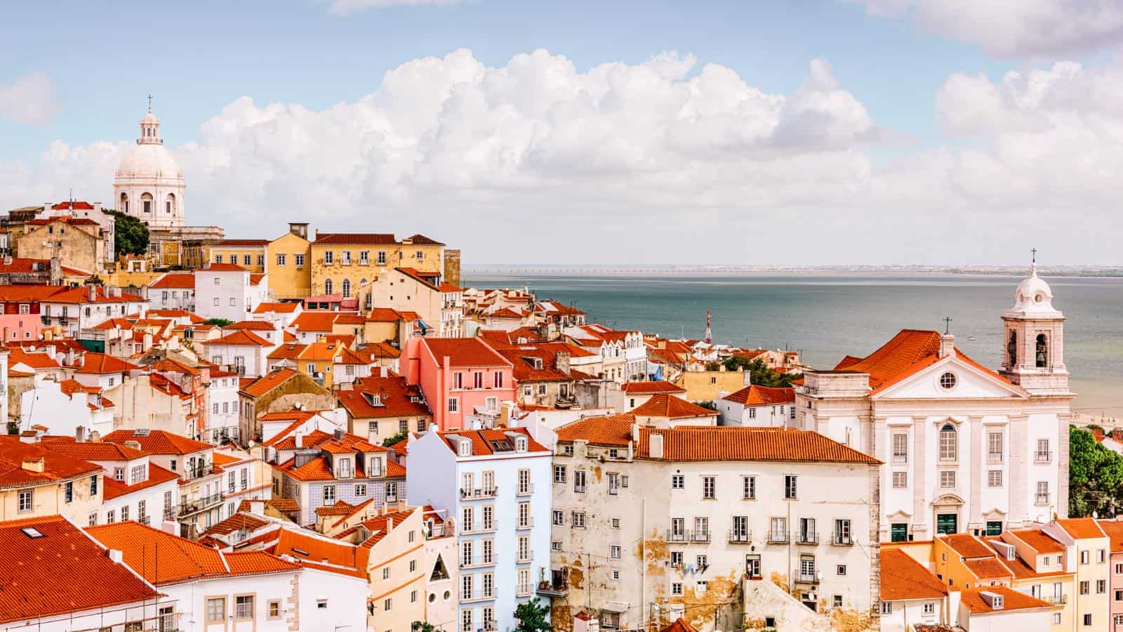Best-Neighborhoods-and-Hotels-to-Stay-in-Lisbon-Alfama-for-Food-Lovers_©-SeanPavonePhoto_Adobe-Stock-Photo_85320889 Best Neighborhoods and Hotels to Stay in Lisbon Alfama for Food Lovers