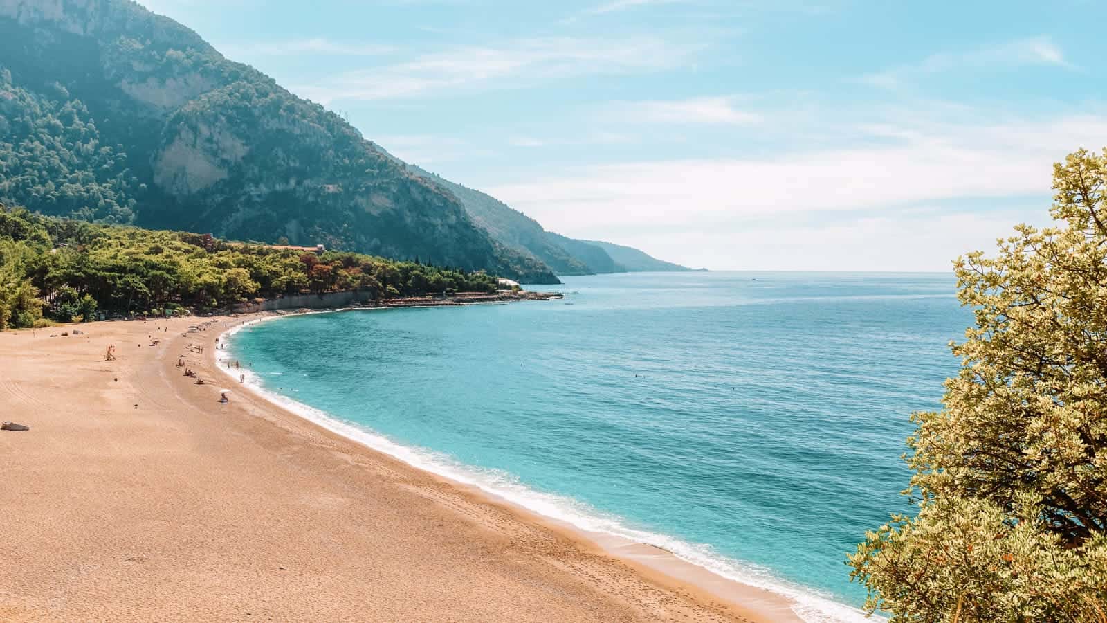Beautiful Kidrak beach with sandy beach and blue water near Oludeniz town on the coast of Mugla region in Turkey 12 Hidden Beaches in Europe to Avoid the Crowds