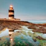 Lighthouses with Ocean Views Hook Lighthouse, Hook Peninsula, Ireland 12 Incredible Lighthouses Offering Spectacular Ocean Views
