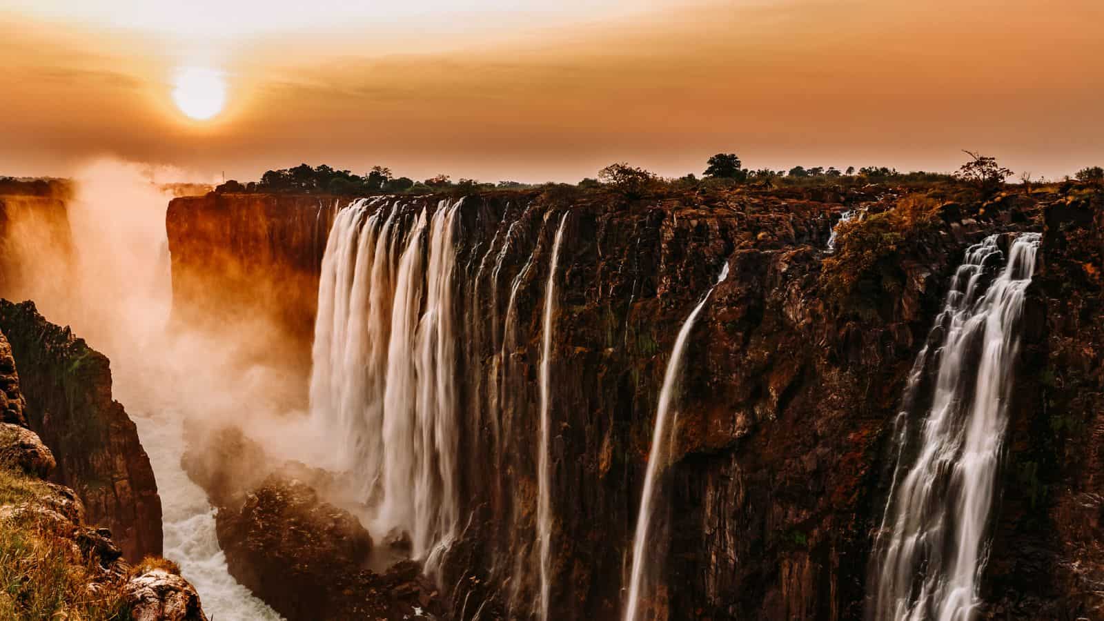 Majestic Waterfalls Around the World to Add to Your Bucket List Victoria Falls, Zambia/Zimbabwe 12 Majestic Waterfalls Around the World To Add to Your Bucket List