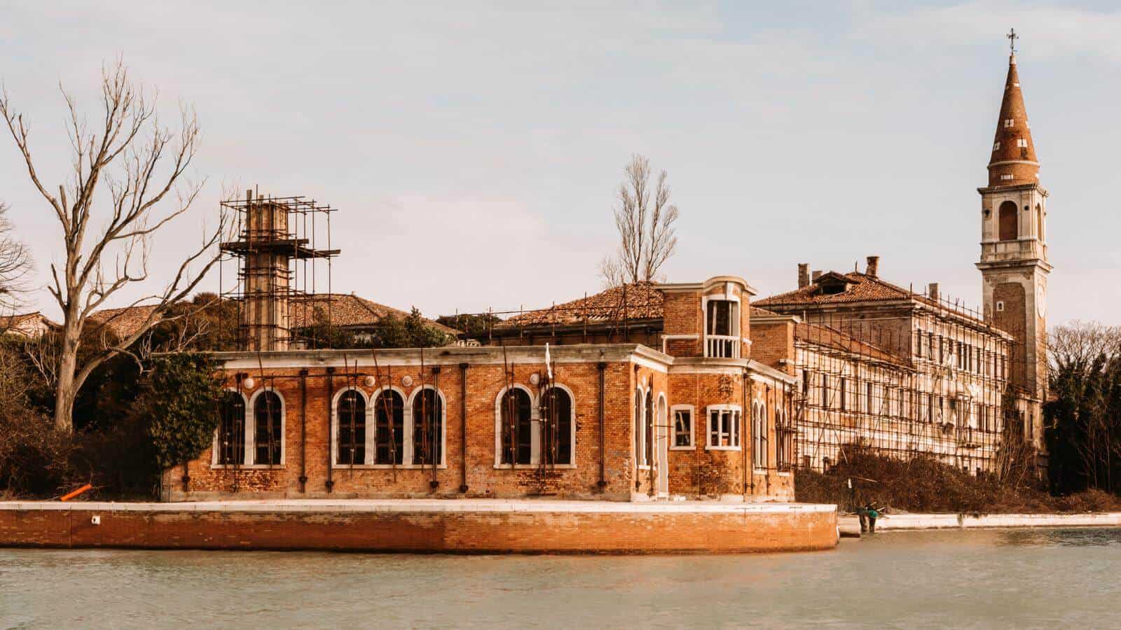 12 Haunted Tourist Destinations That Are Not for the Faint of Heart Haunted Destinations for the Brave at Heart Poveglia Island Venice Italy © Jean Patrick Adobe Stock Photo 343551098 - 12 Haunted Tourist Destinations That Are Not for the Faint of Heart