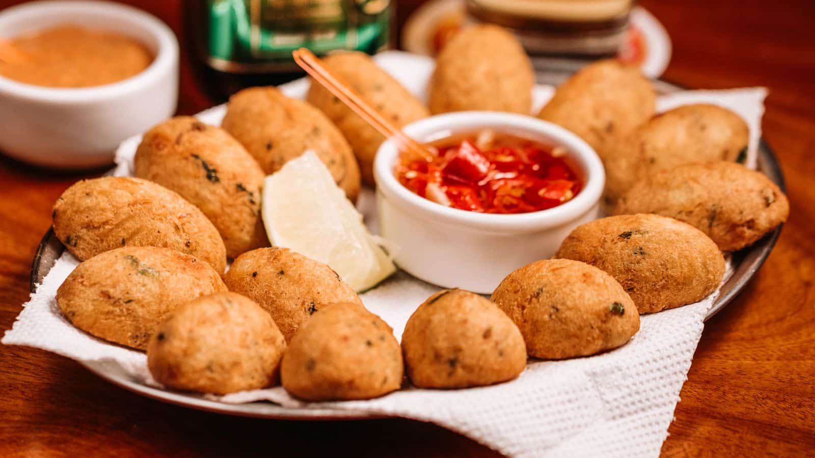 12 Portuguese Dishes So Good, You'll Want To Book a Flight Just To Eat Portuguese Dishes Traditional Bacalhau Lisbon © Daniel Adobe Stock 217076122 - 12 Portuguese Dishes So Good, You'll Want To Book a Flight Just To Eat