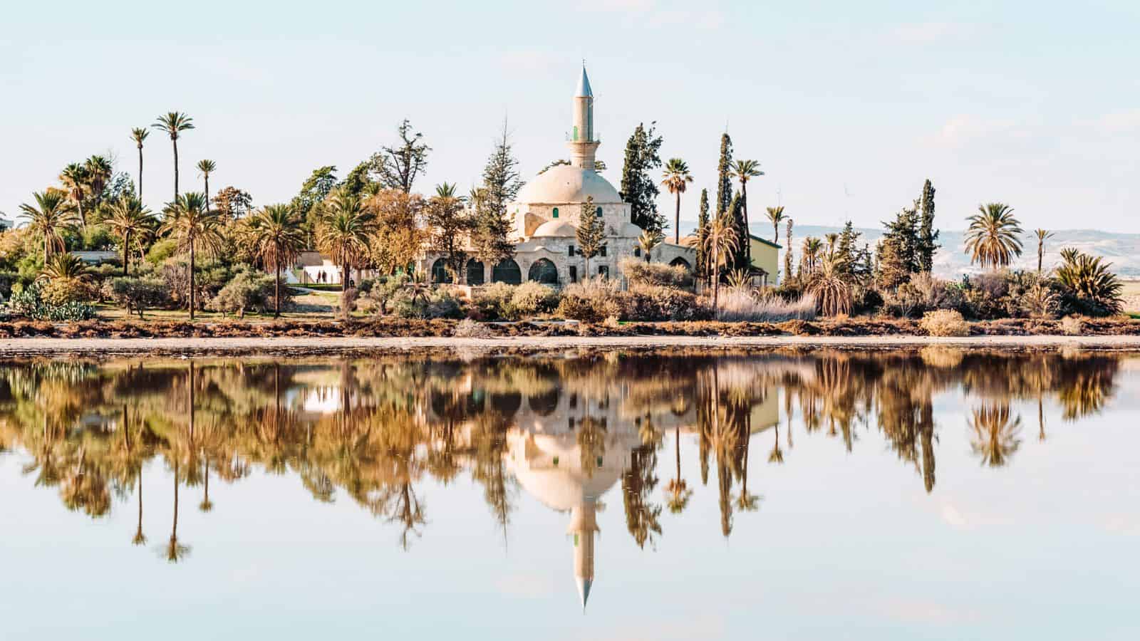 12 Non-Schengen Countries in Europe That’ll Make You Wonder Why You Ever Stuck to the Usual Destinations Non Schengen Countries To Visit in Europe Cyprus Hala Sultan Tekke Mosque on Salt lake Larnaka © Romanevgenev Adobe Stock 227095920 - 12 Non-Schengen Countries in Europe That’ll Make You Wonder Why You Ever Stuck to the Usual Destinations