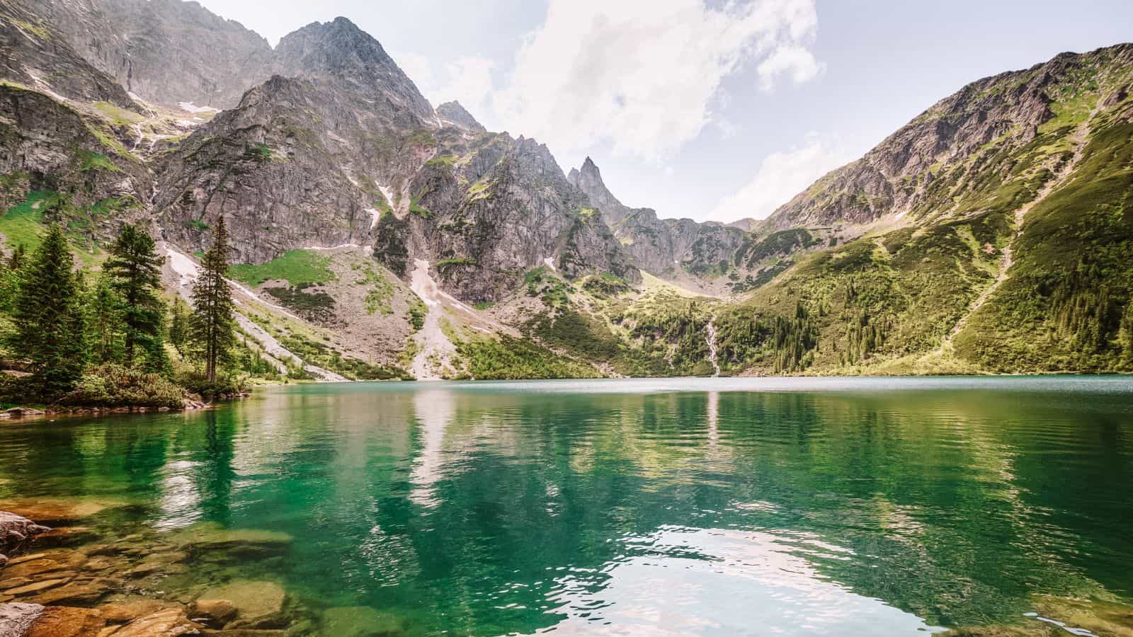 Unique Accommodations in Europe_Domki pod Gubałówką, Poland_Tatra mountains and lake_© Patryk Kosmider_Adobe Stock_54050852 Unique Accommodations in Europe Domki pod Gubałówką, Poland Tatra mountains and lake