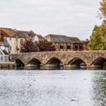 Unique Accommodations in Europe_Railway Hotel, England_River Avon at Fordingbridge, UK_© Nicola_Adobe Stock_387447070 Unique Accommodations in Europe Railway Hotel, England River Avon at Fordingbridge, UK